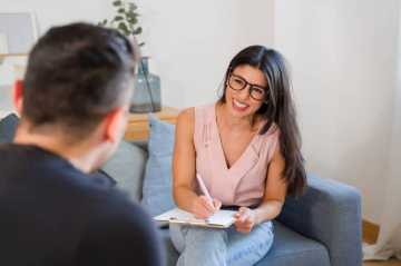 Mental Health Technician providing compassionate patient care in a behavioral health facility